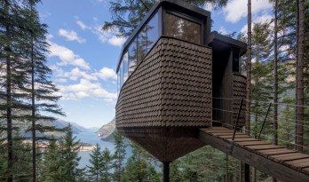 挪威“鸟巢式”小屋，一根树干支撑起15㎡空间 / Helen & Hard