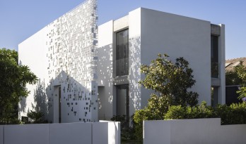 一堵“逐渐消失”的墙，溶解像素屋 / Anderman Architects