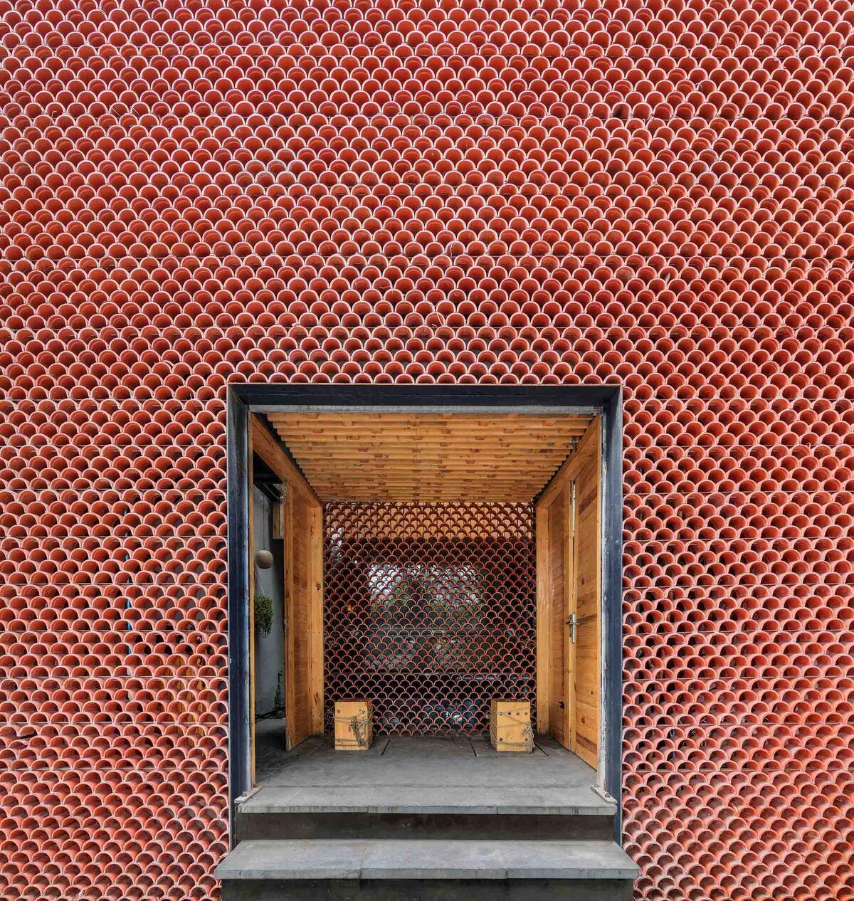 koi-farm-farming-architects-hanoi-vietnam-renovation-architecture_dezeen_2364_col_3.jpg