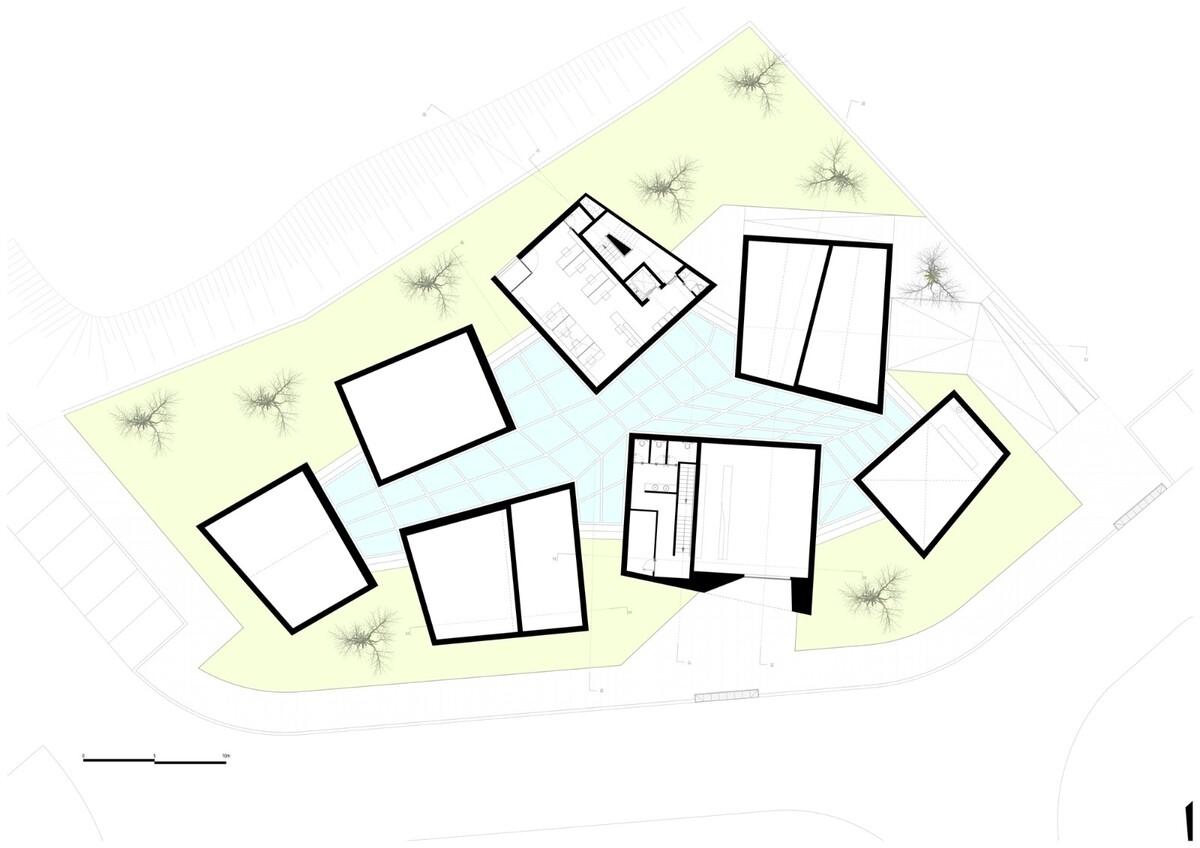 朴素而具有纪念性，古罗马建筑的现代诠释：波尔图口译中心 / spaceworkers