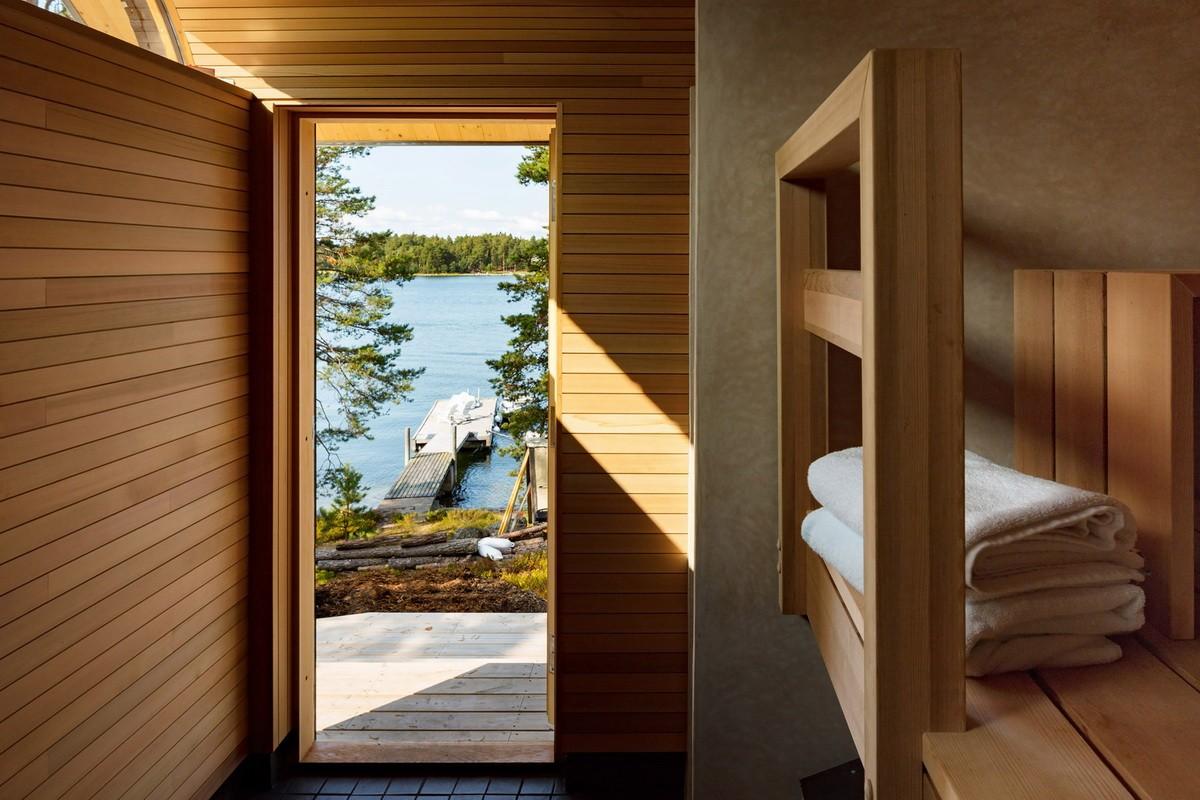融入海岸，眺望日落：芬兰桑拿旅馆 / Mer Architects