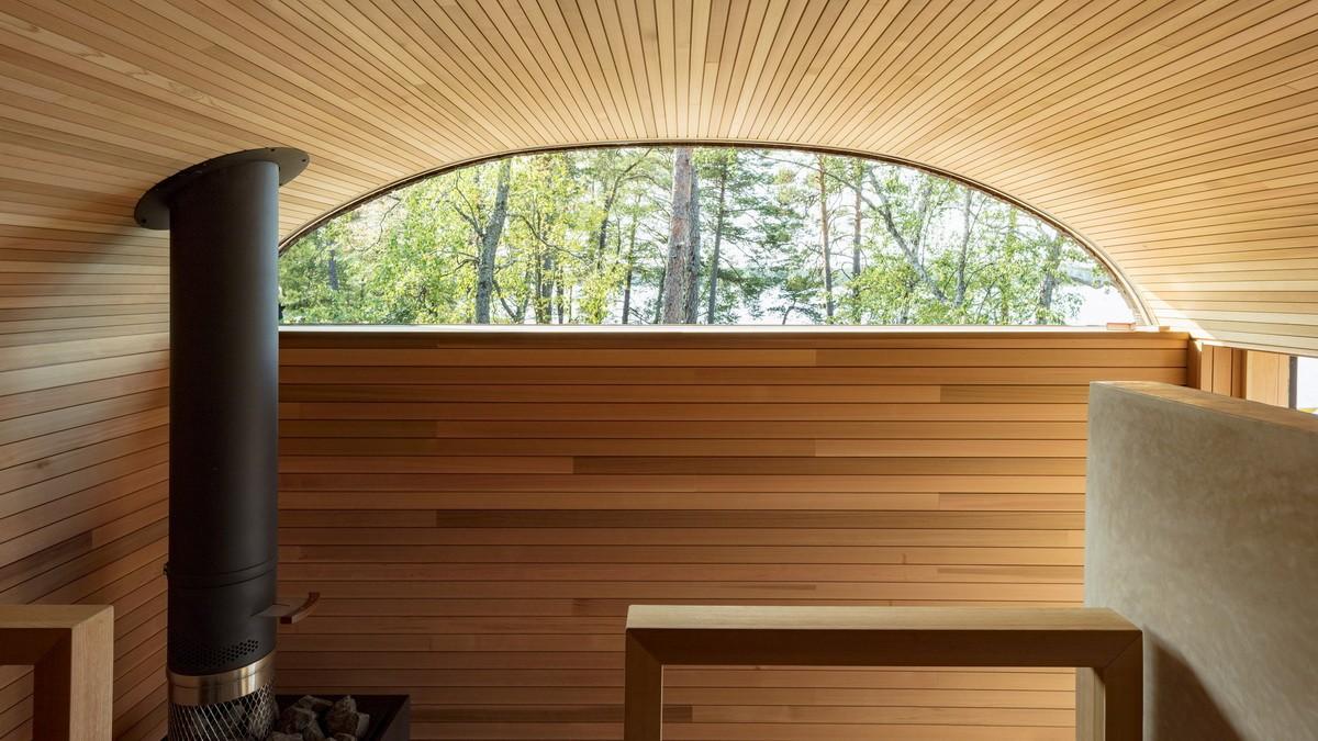 融入海岸，眺望日落：芬兰桑拿旅馆 / Mer Architects