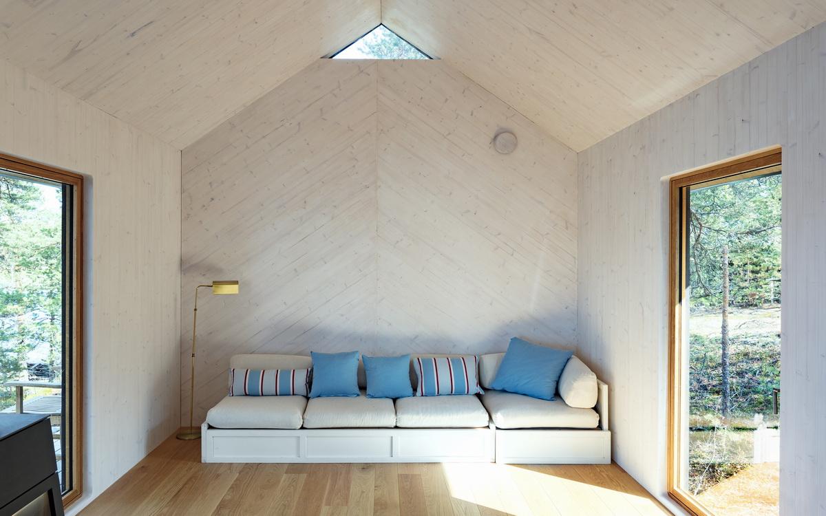 融入海岸，眺望日落：芬兰桑拿旅馆 / Mer Architects