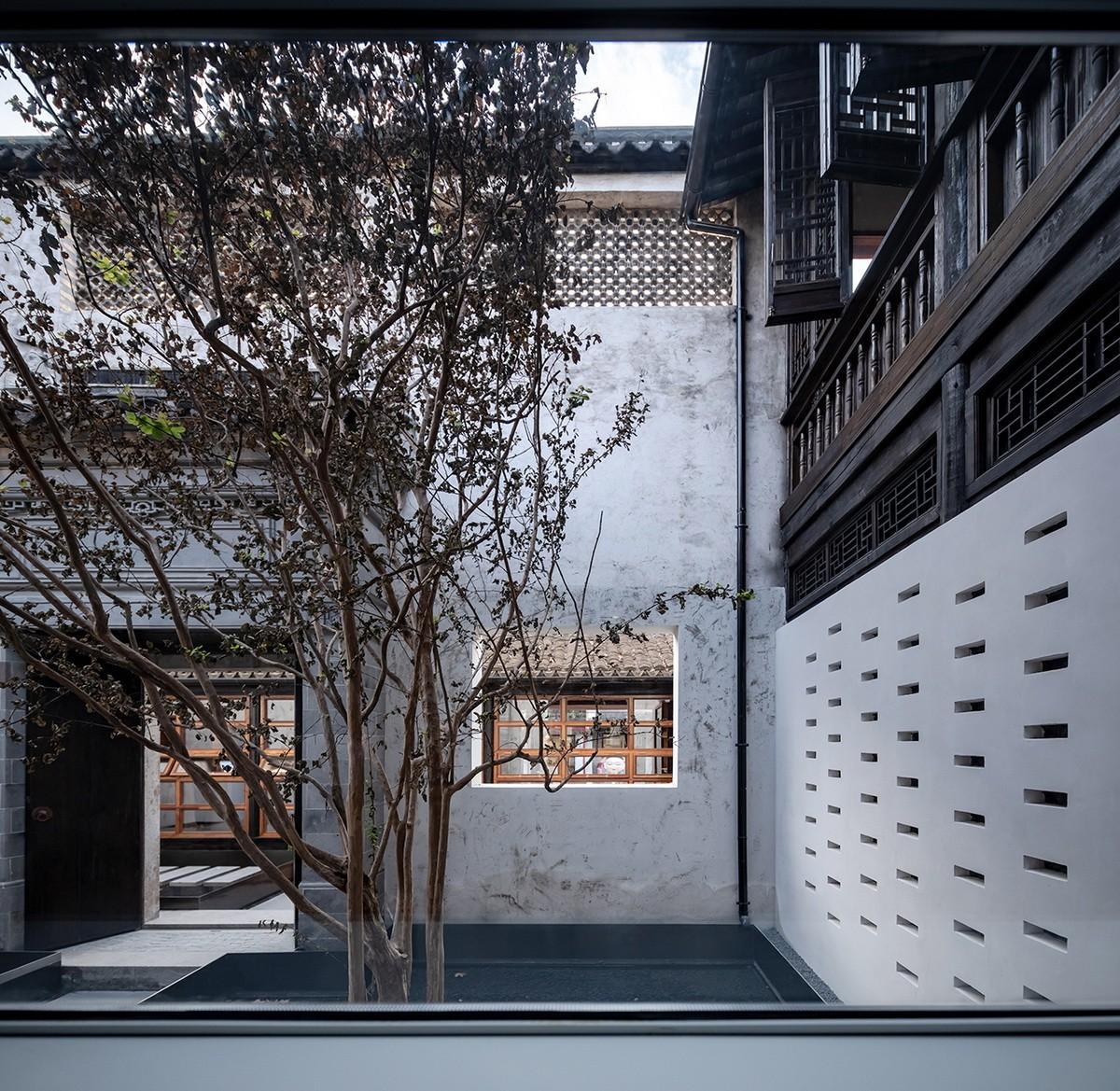 白墙黛瓦下营造现代温暖空间，挚舍南禅观水酒店 / 本哲建筑