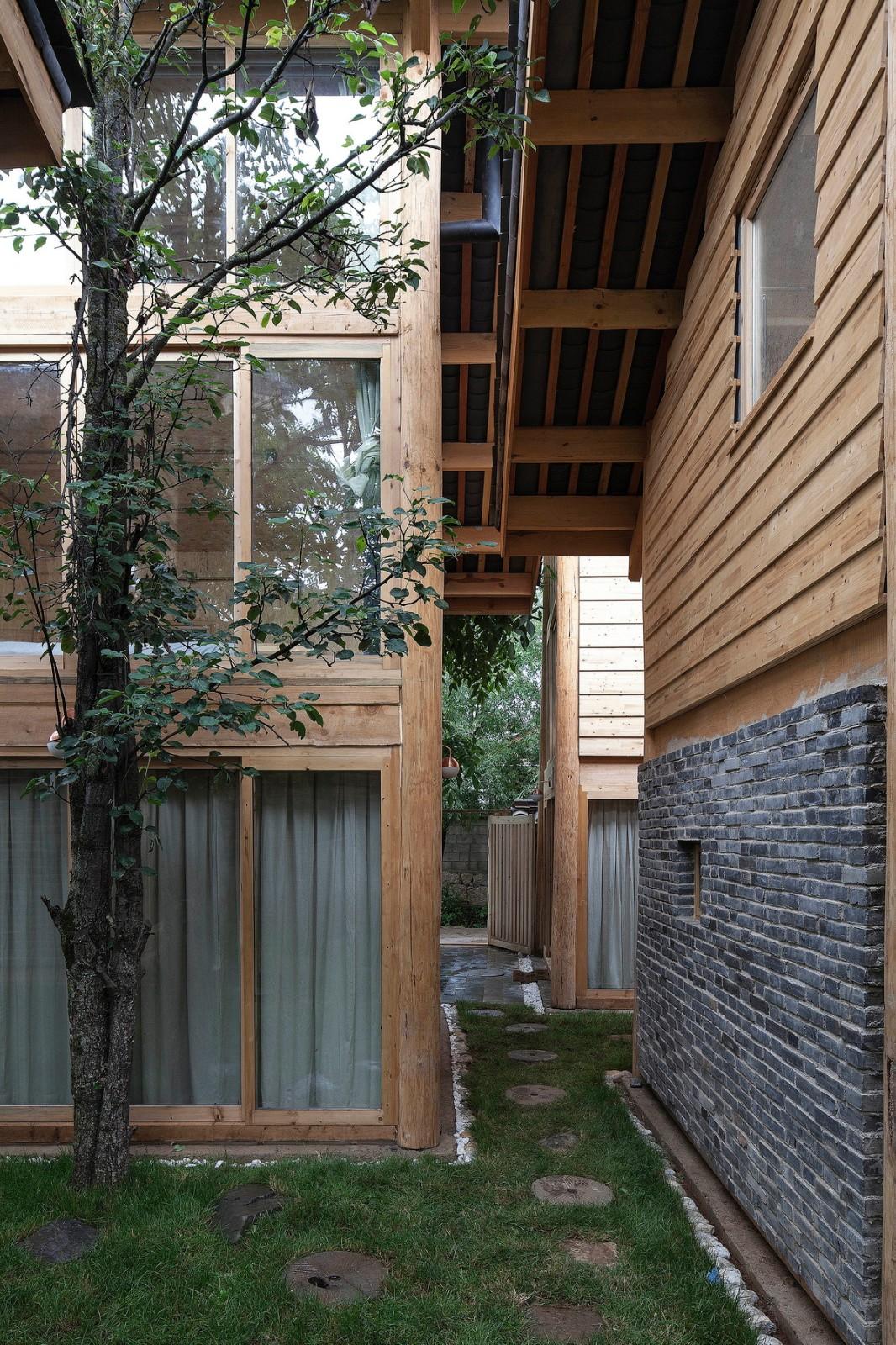 云南丽江白沙古镇酒店 / Atelier8 + 上海高目建筑设计事务所