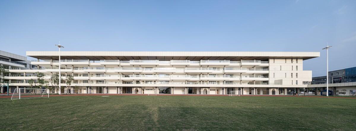 苏州大学高邮实验学校 / 九城都市建筑